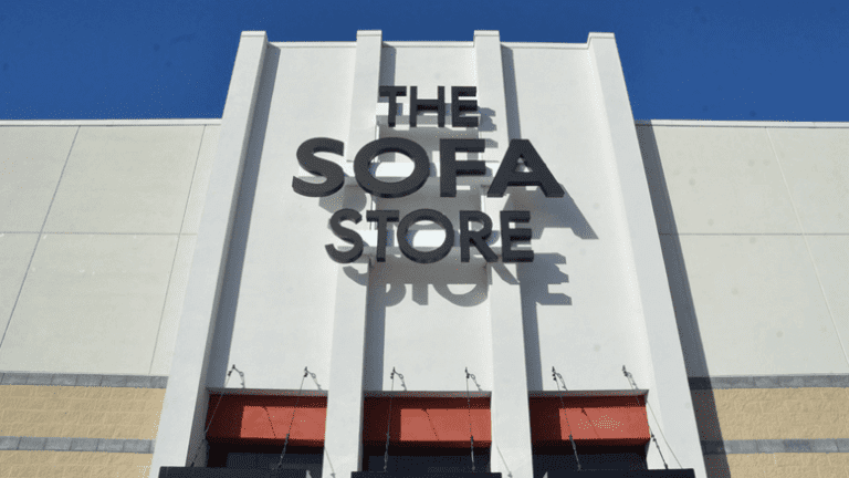 The Sofa Store logo on their building