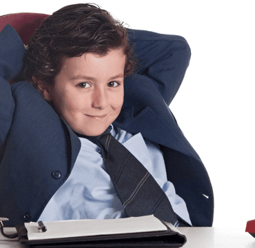 Young boy in a business suit