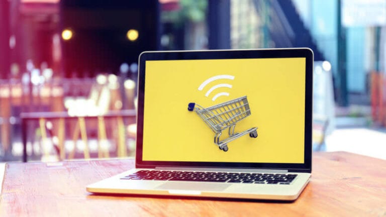 Image of a shopping cart on a laptop