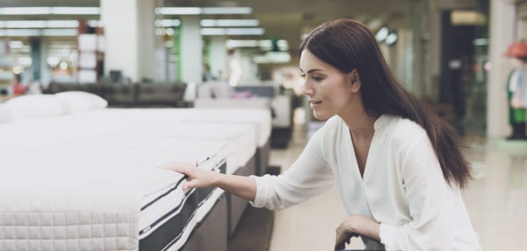 Woman mattress shopping