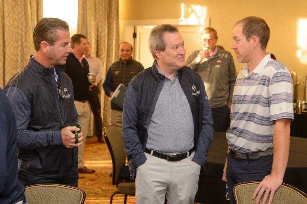 Photo shows Brian Woods, Oscar Miskelly and Trey Van Hoose at CEO Summit
