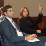 Imagine shows a man and woman in a meeting room