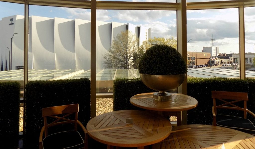 Imagine shows a showroom building through a window