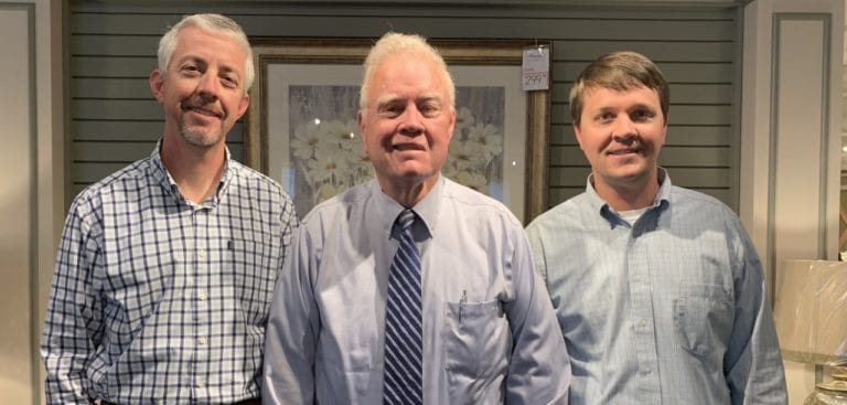 Image shows three men