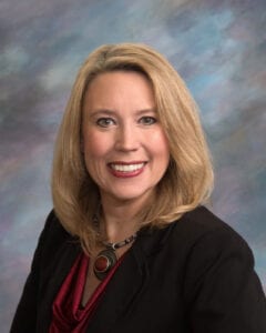 Image shows a woman