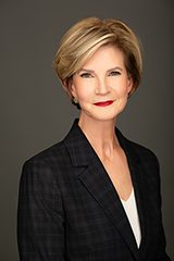Image shows a woman