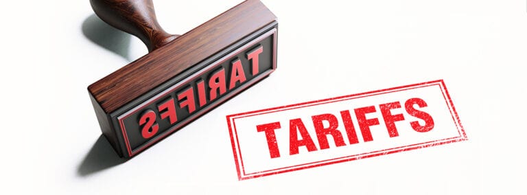 Stamp with the word "Tariffs" on it