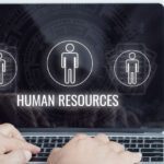 Person looking at the HFA Human Resources Portal on a laptop