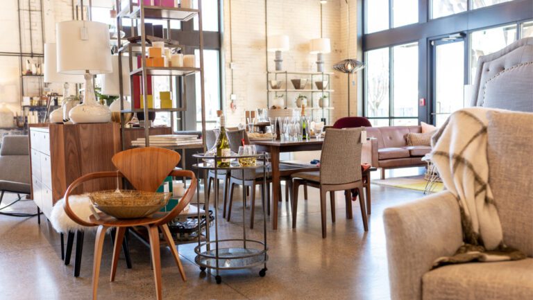 The inside of a furniture store with furniture and accessories displayed