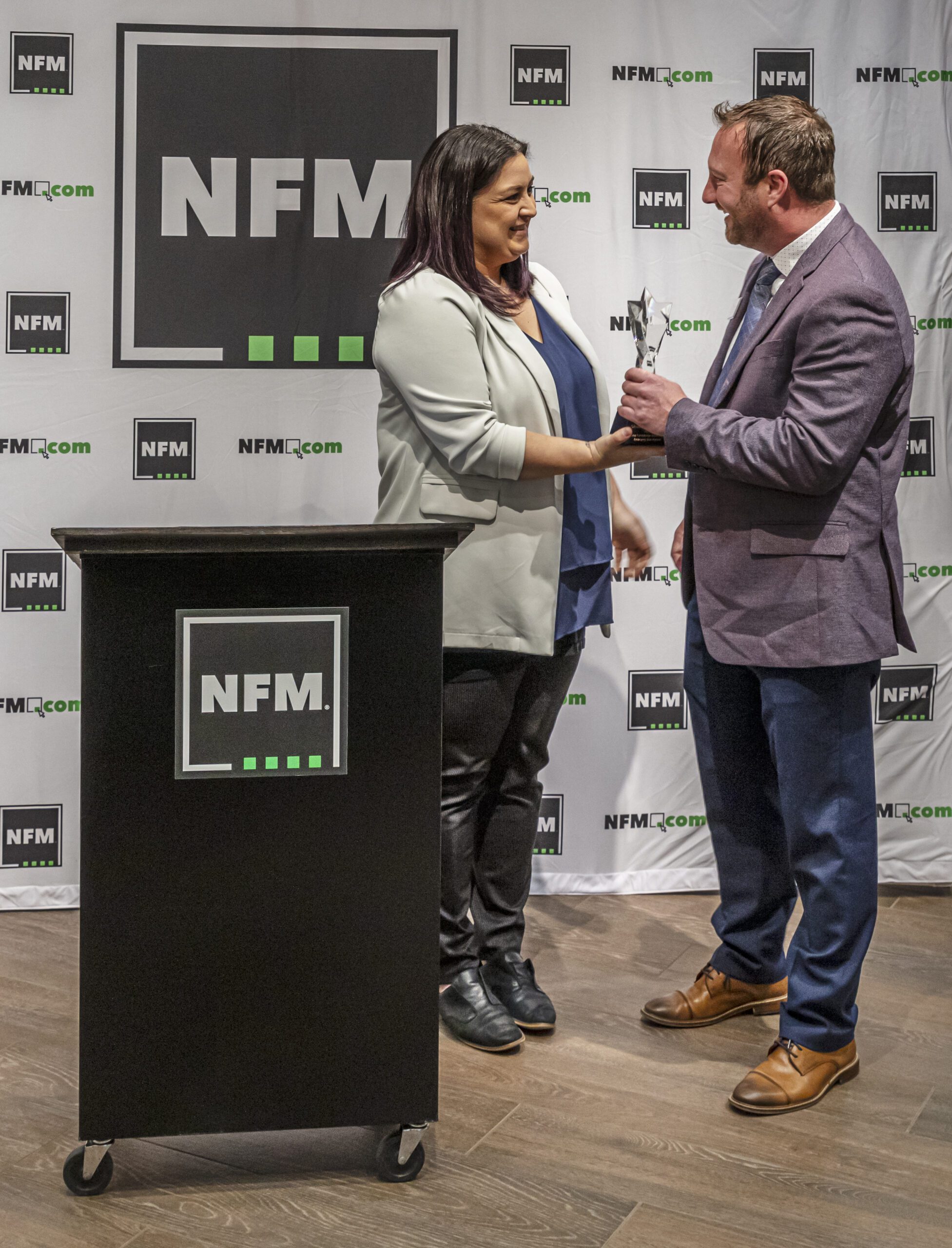 Shannon Williams, HFA presenting Shane Pohlman with the 2024 HFA Emerging Star Award