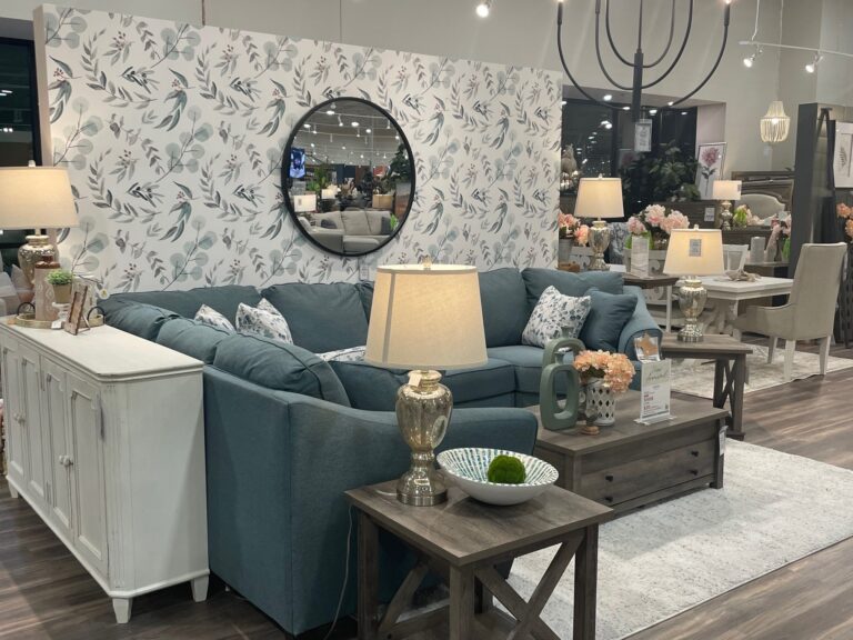 Home Furnishings store display featuring a blue sofa set.