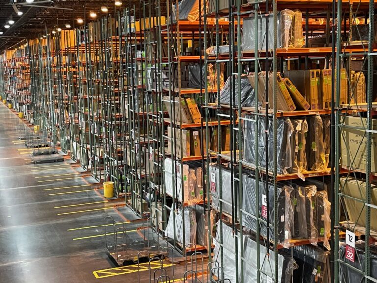 Warehouse racking operations in a furniture store warehouse