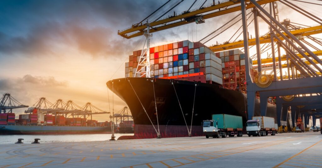 Cargo ship being off loaded in a Shipping Port.