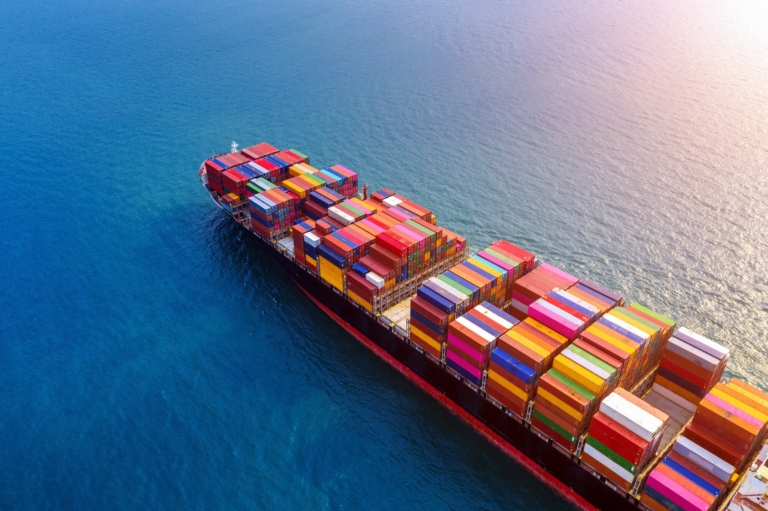 Colorful shipping container ship floating on the ocean. Created by Freepik.com