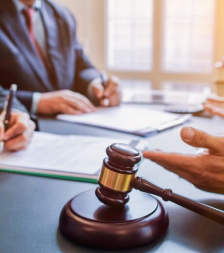 Judge gavel is placed on table in office of lawyer team It is gavel used as symbol of making decision in court case with fairness and ethics. judge gavel is prepared symbolize decision in court case.