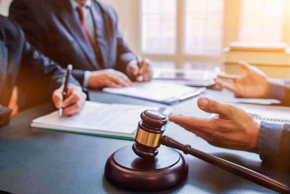 Judge gavel is placed on table in office of lawyer team It is gavel used as symbol of making decision in court case with fairness and ethics. judge gavel is prepared symbolize decision in court case.