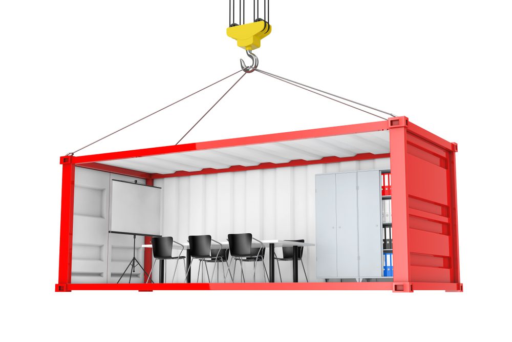Red Cargo Shipping Container with Removed Side Wall Converted into an Office During Transportation with Crane Hook on a white background. 3d Rendering.