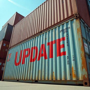 a group of import shipping containers with the word UPDATE stamped over the top.