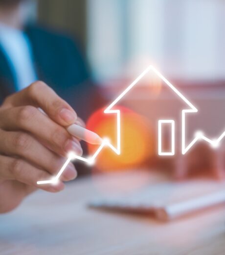 real estate investment energy efficiency rating and property value, Real estate online. new home for the family, home search, land price, property tax man using computer working with virtual chart