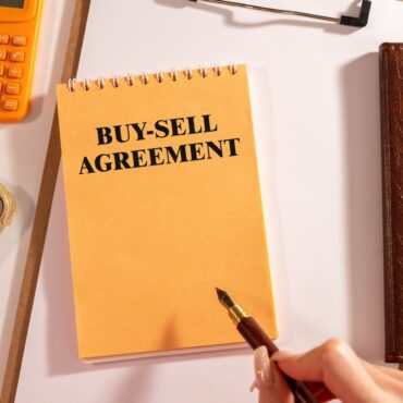 Desk top that contains a buy/sell agreement