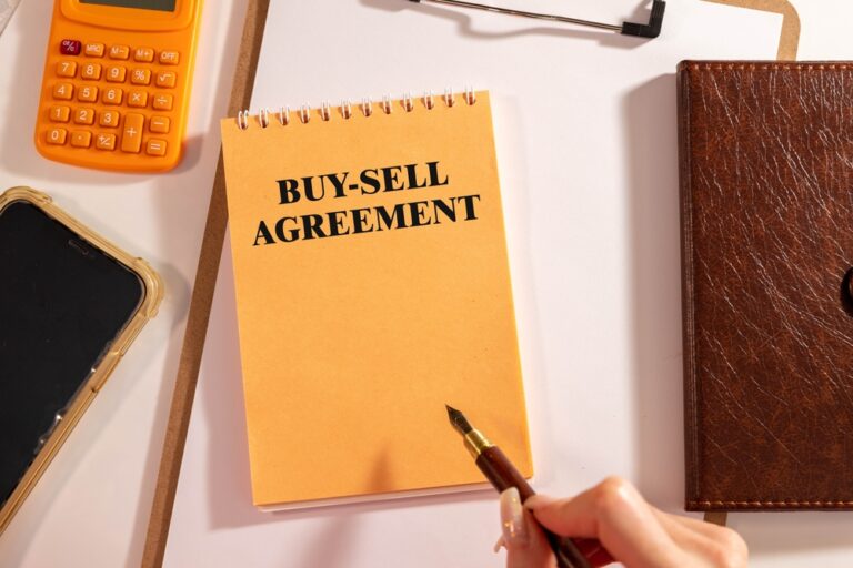 Desk top that contains a buy/sell agreement