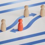 Red and white pawns with golden arrows. Employee swap or turnover concept.Leadership with business success concept.3D rendering on white background.