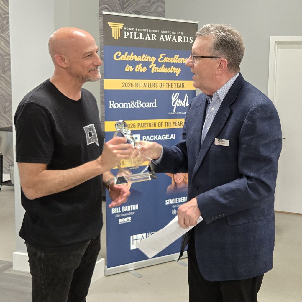 Peter Theran presents Ziv Fass the 2026 HFA Partner of the Year Award