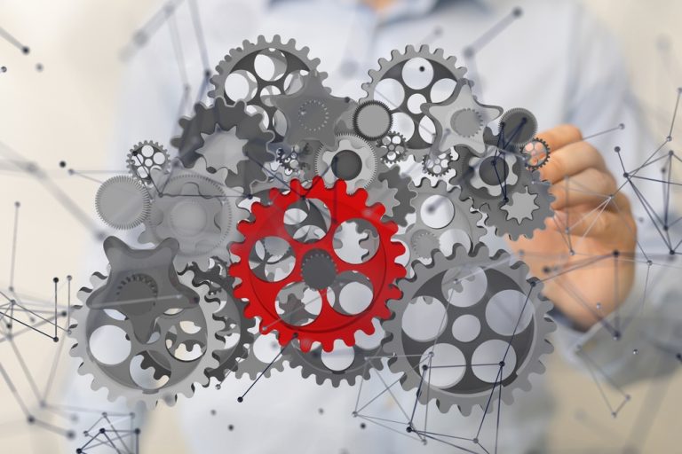 Interlocking Gears: Complex System Teamwork Concept