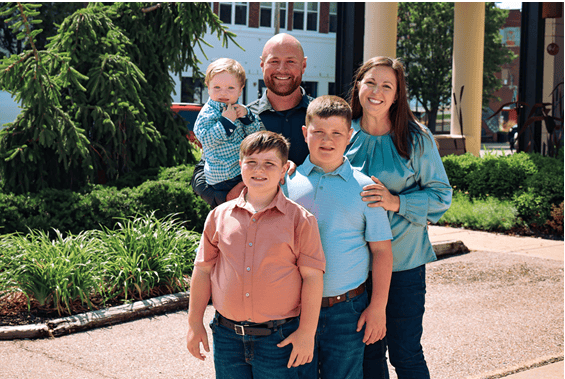 Phil and Kaleigh Good with children.